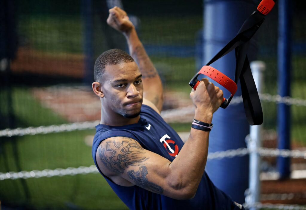 Byron Buxton training intensely in gym showing athleticism strength and baseball focus wallpaper