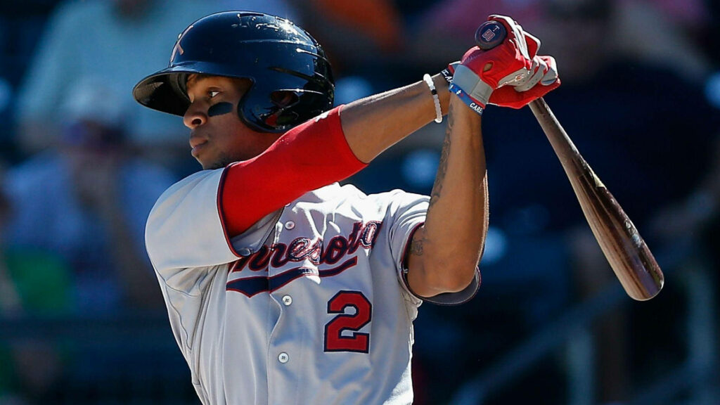 Byron Buxton mid-swing baseball wallpaper vivid face paint team uniform intense action