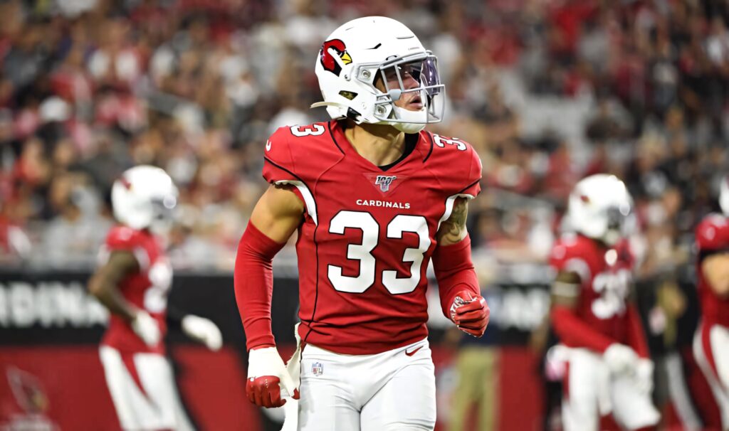 Byron Murphy in Arizona Cardinals uniform mid-action football game dynamic athleticism focus Wallpaper