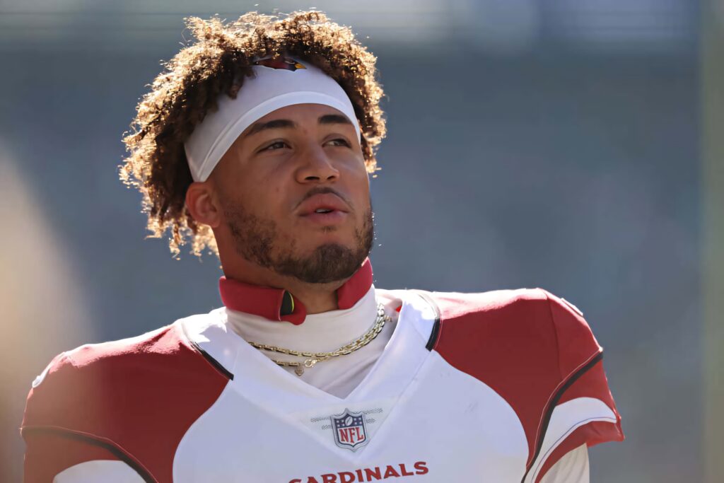 Byron Murphy in Arizona Cardinals uniform focused and intense ready for football action wallpaper