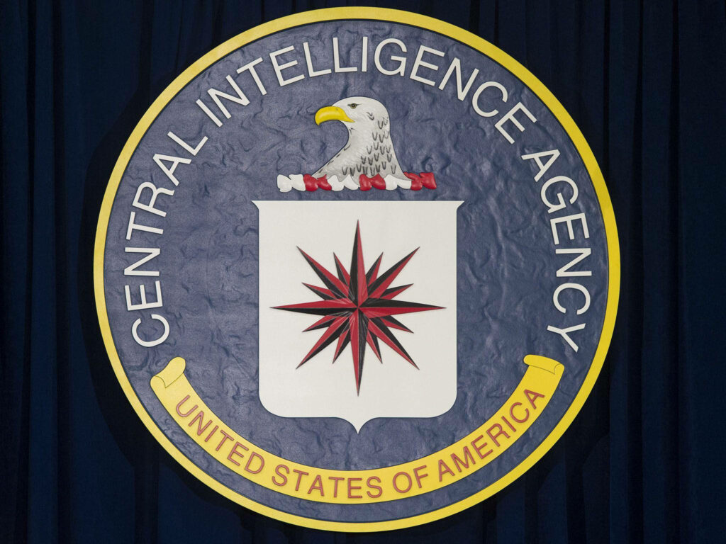 CIA logo wallpaper with bold eagle compass star and Central Intelligence Agency text on dark background