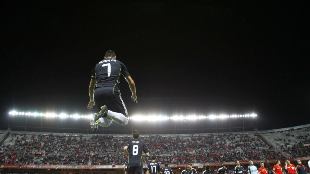 CR7 Incredible Leap: Dynamic Football Wallpaper for Fans