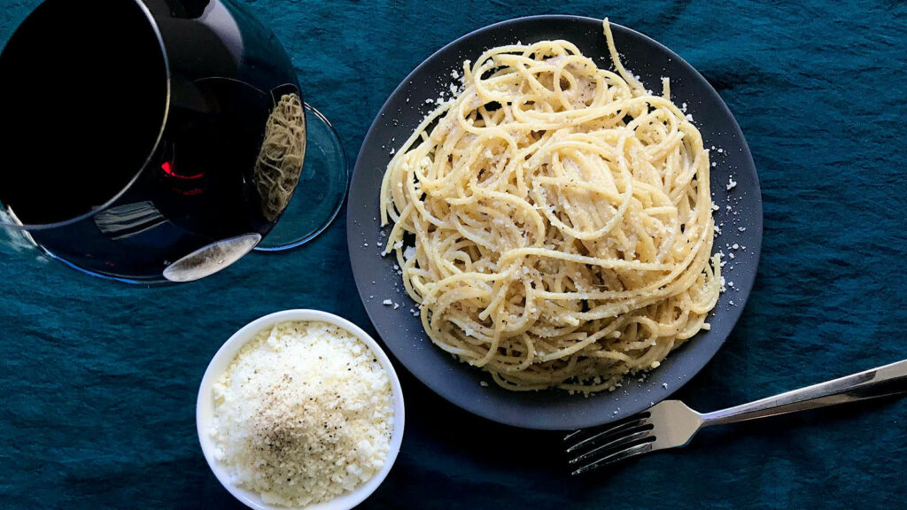 Classic Cacio e Pepe Wallpaper with Red Wine & Cheese Accents