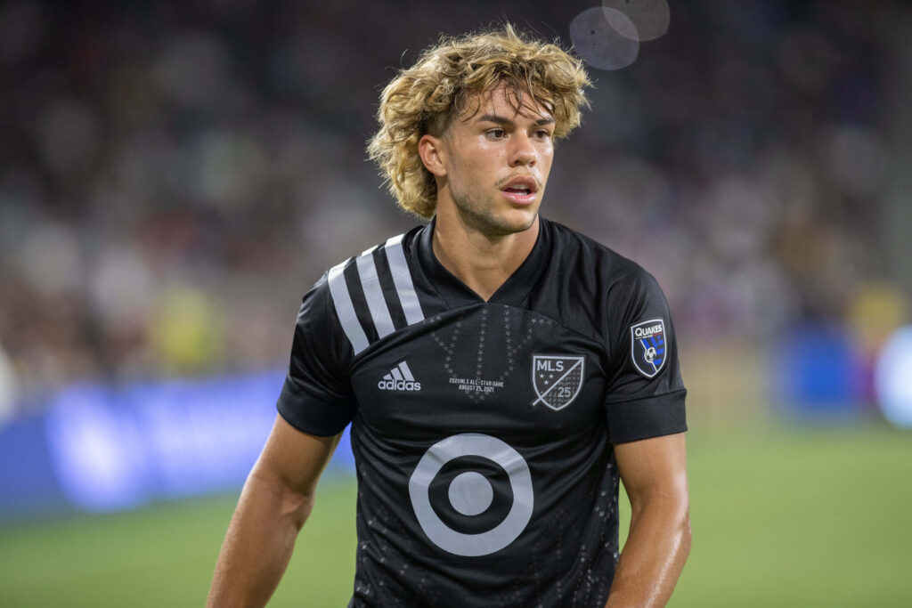 Cade Cowell in black MLS All-Star jersey under stadium lights showing intense focus Wallpaper