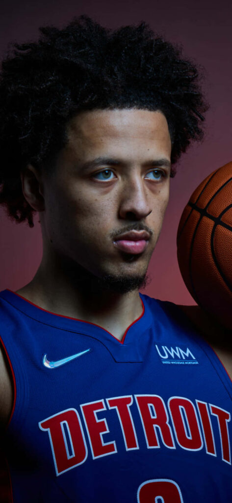 Cade Cunningham Detroit Pistons basketball portrait vibrant blue red jersey focused expression wallpaper
