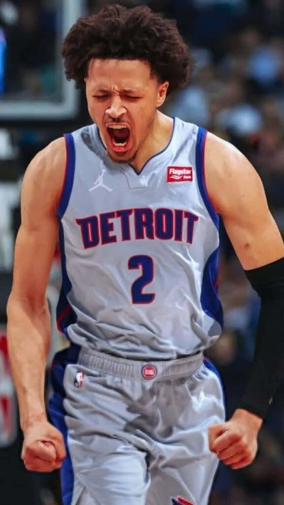 Cade Cunningham mid-celebration Detroit Pistons gray jersey intense focused basketball portrait wallpaper