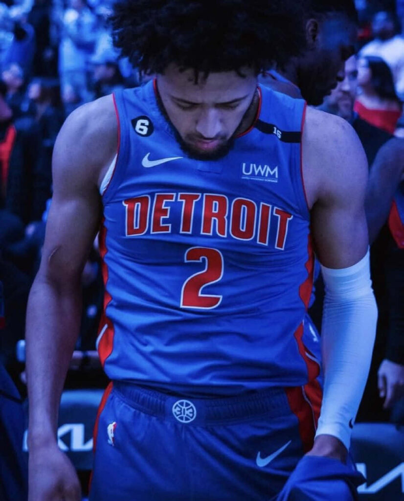 Cade Cunningham Detroit Pistons focused intense basketball player cool blue tones wallpaper