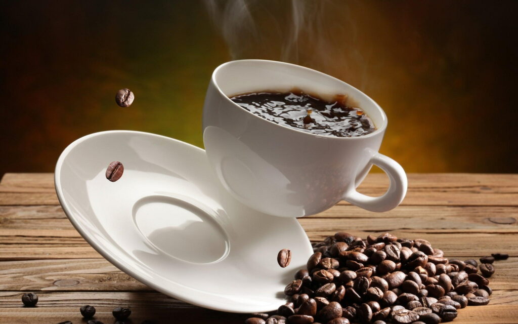 Java Jolt: Stunning High Resolution Image of Falling Coffee for QHD Wallpaper and Background Photos
