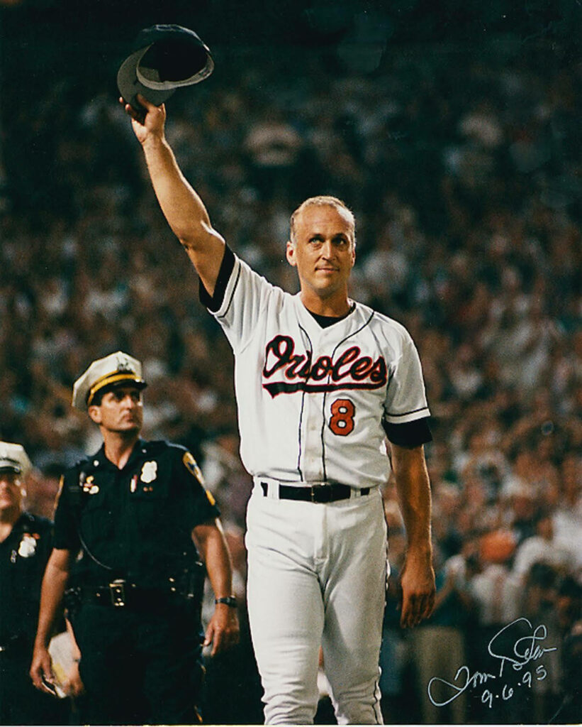 Cal Ripken Jr. Orioles number eight celebrating under stadium lights baseball wallpaper background