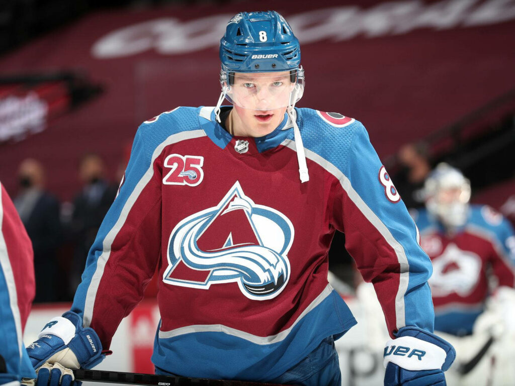 Cale Makar Colorado Avalanche defenseman in number 8 jersey intense focused ice hockey action Wallpaper