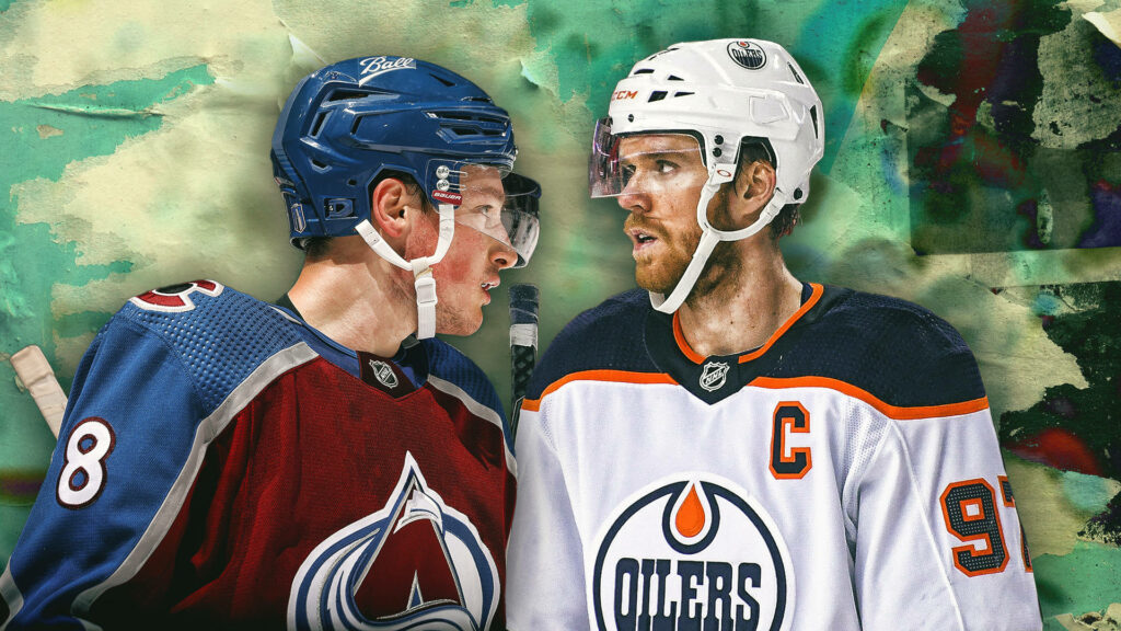 Close-up intense NHL rivalry between Cale Makar Avalanche and Connor McDavid Oilers wallpaper background