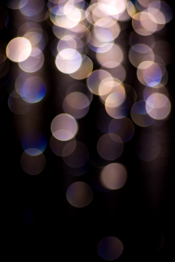 Calm Bokeh Lights Wallpaper: Abstract Design on Dark Background