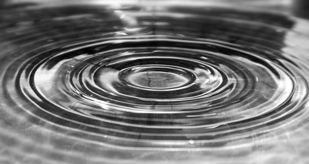 Mesmerizing Black and White Water Ripple Wallpaper Background