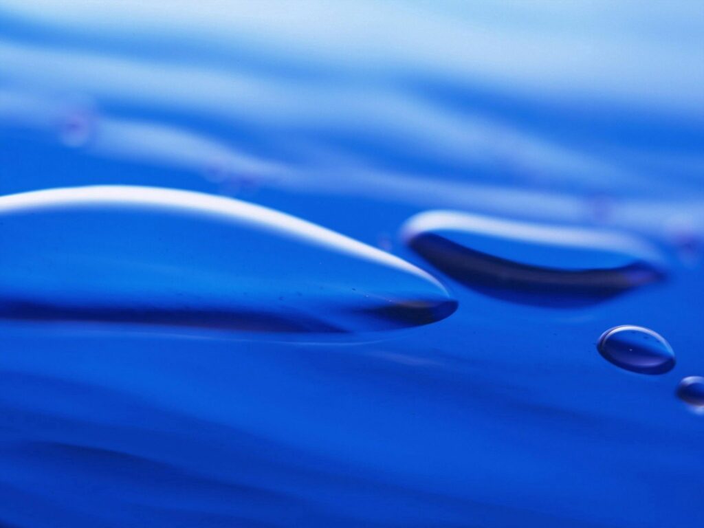 Calm Blue Liquid Wallpaper: Close-Up Water Drops for Refreshing Vibes