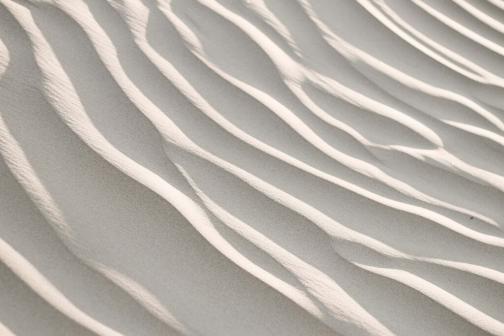 Serene Sand Pattern on Minimalist White Wall - Elegant Wallpaper Background