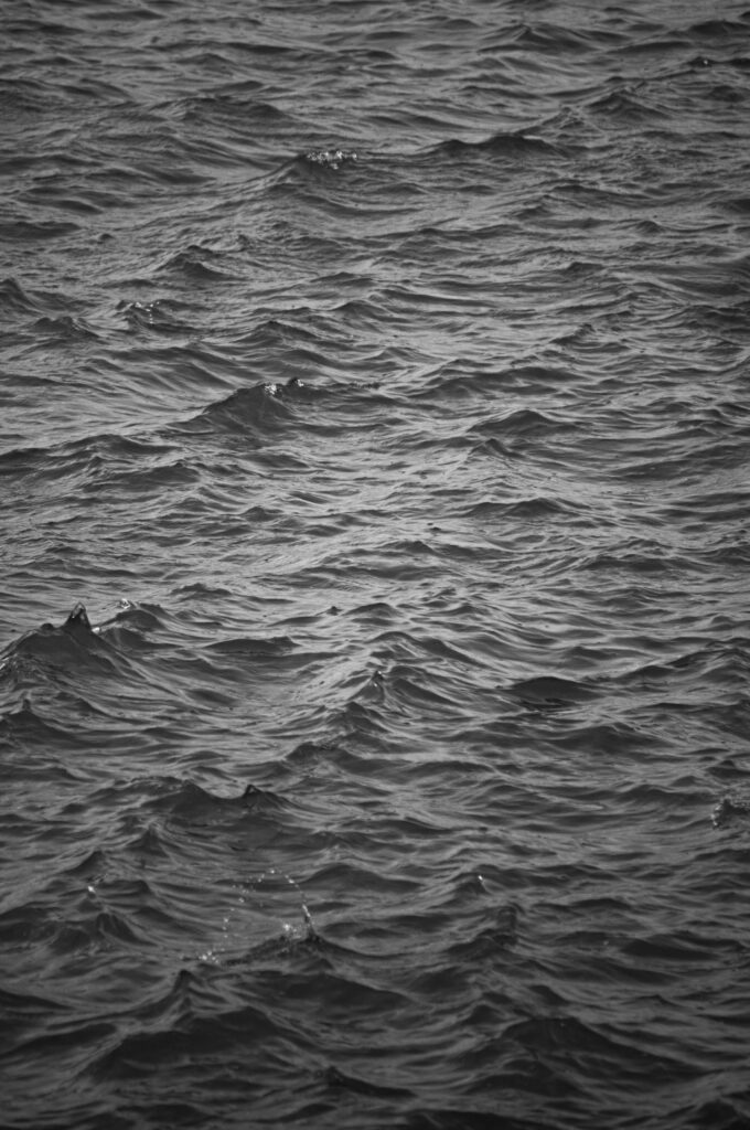 Calming Black and White Wallpaper of Serene Waves and Ripples