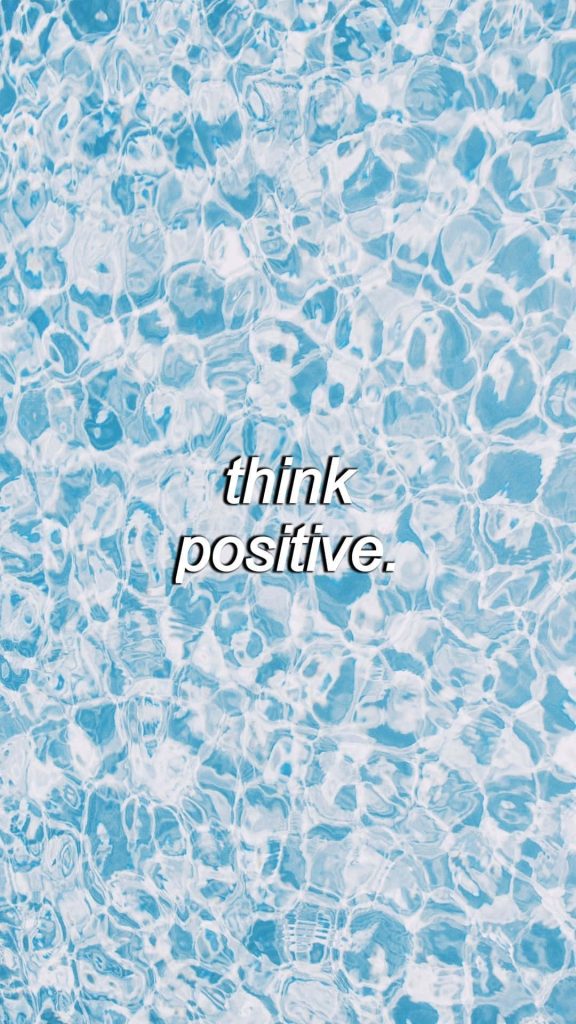 Blue water ripple wallpaper with think positive text soothing uplifting mobile background