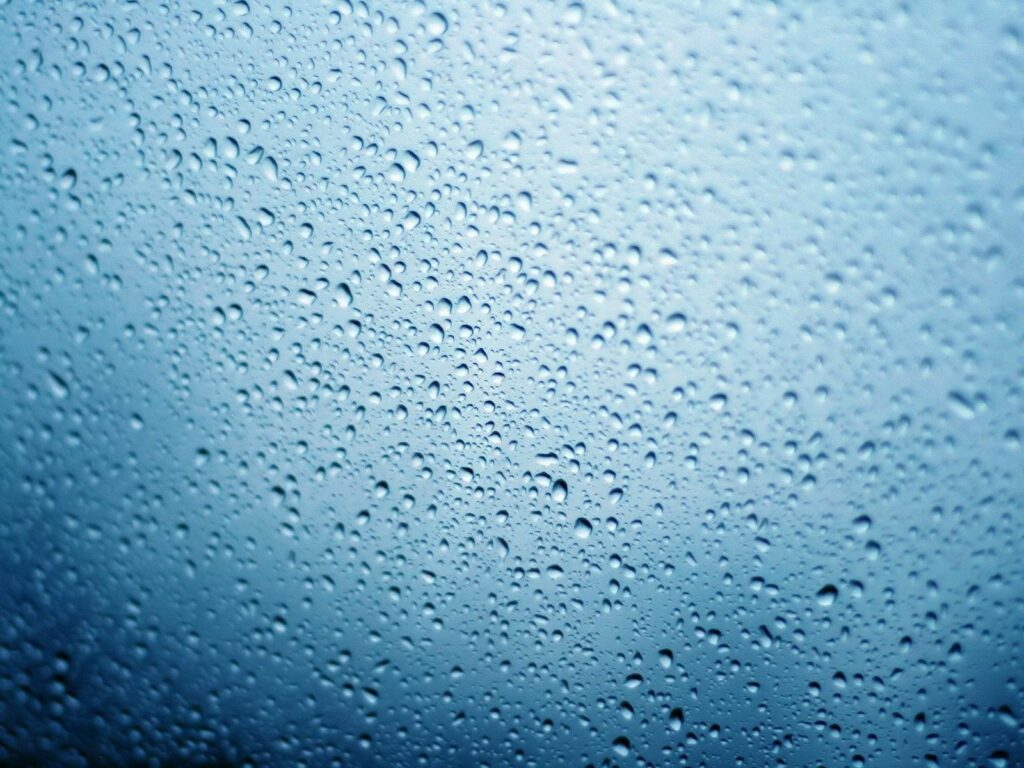 Refreshing Blue Wallpaper with Water Droplets for a Serene Background