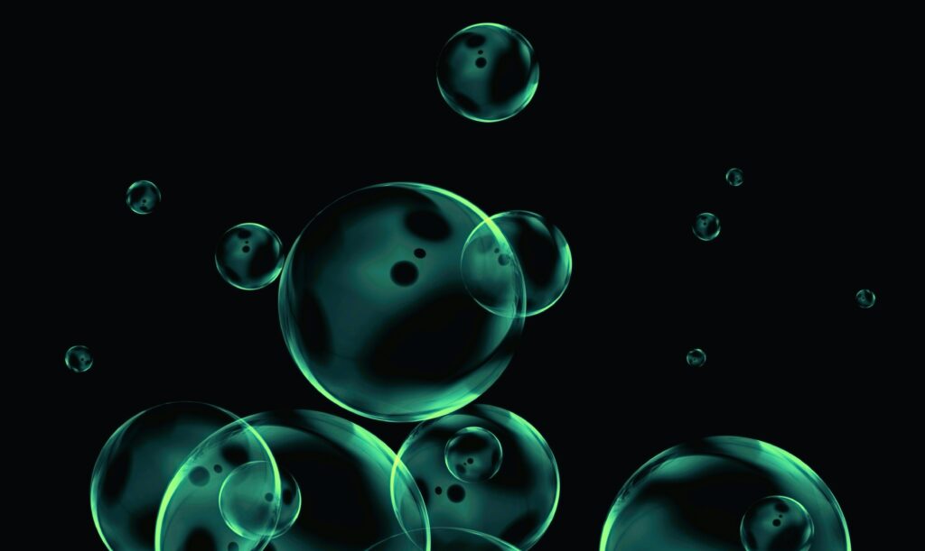 Abstract Green-Tinged Bubbles Wallpaper on Dark Background - 5000x2985