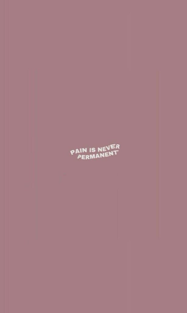 Minimalist wallpaper with muted mauve background and white text PAIN IS NEVER PERMANENT motivational
