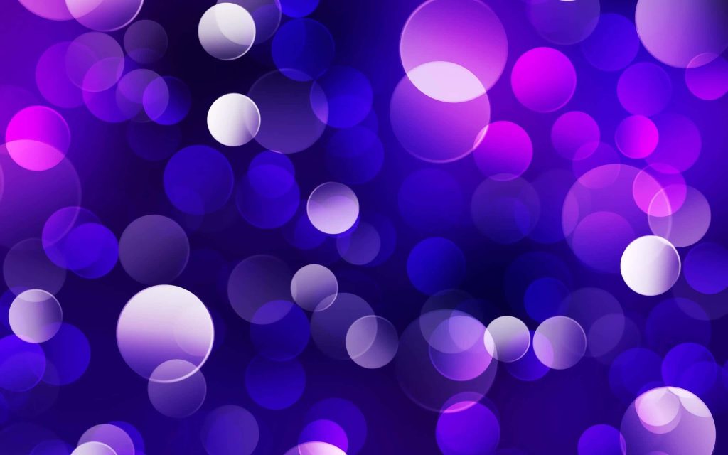 Abstract purple wallpaper with translucent overlapping circles and soft bokeh effect background