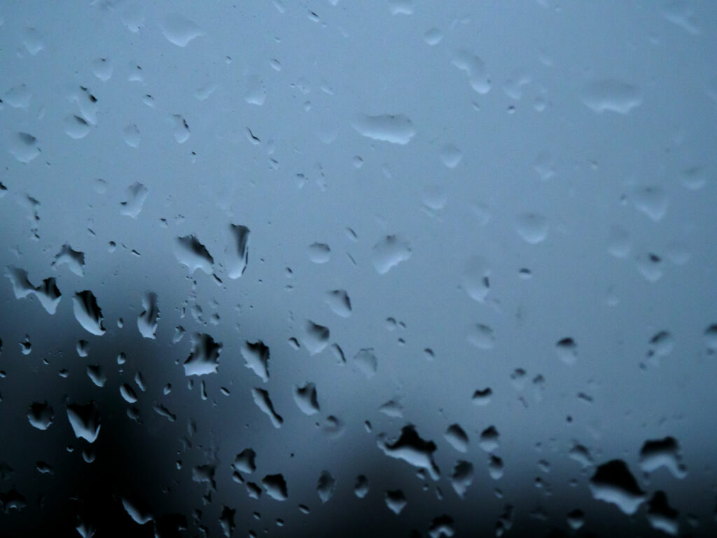 Calming Macro Water Droplets on Glass – Rainy Day Wallpaper
