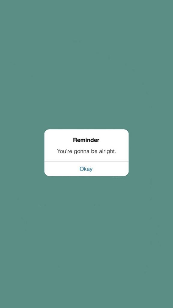 Minimalist sage green wallpaper with calming reminder You’re gonna be alright notification pop-up