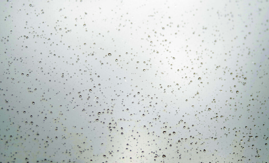 Calming Raindrop Wallpaper: Soothing Minimalist Glass Background