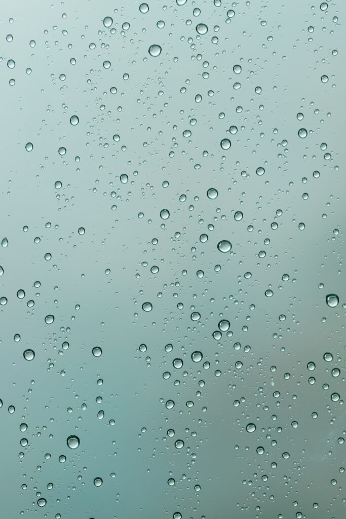 Calming Wallpaper: Macro Water Droplets on Soft Glass Background