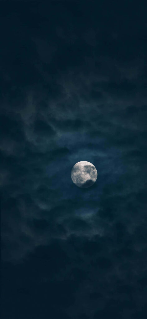 Calming Full Moon iPhone Wallpaper: Soft Clouds & Dark Sky Background
