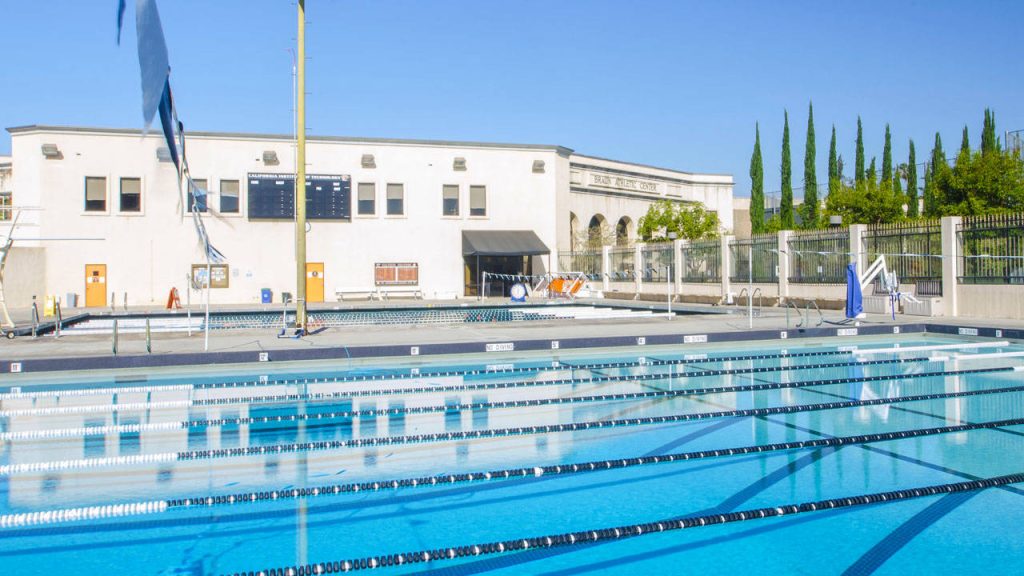Bright blue swimming pool lanes at Braun Athletic Center Caltech outdoor aquatic facility wallpaper
