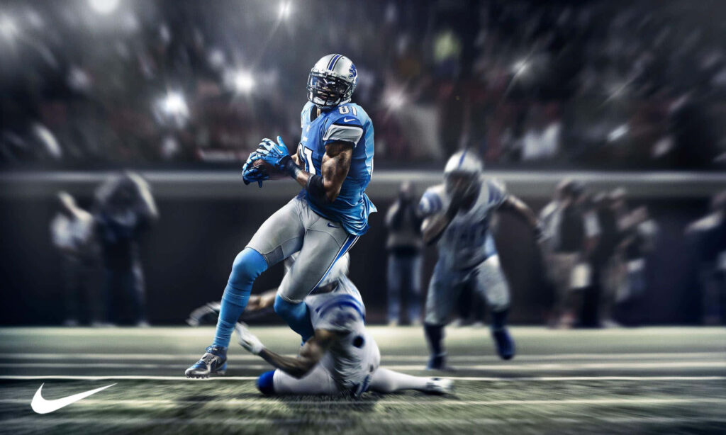 Calvin Johnson Detroit Lions NFL football action dynamic wallpaper blue silver tones speed