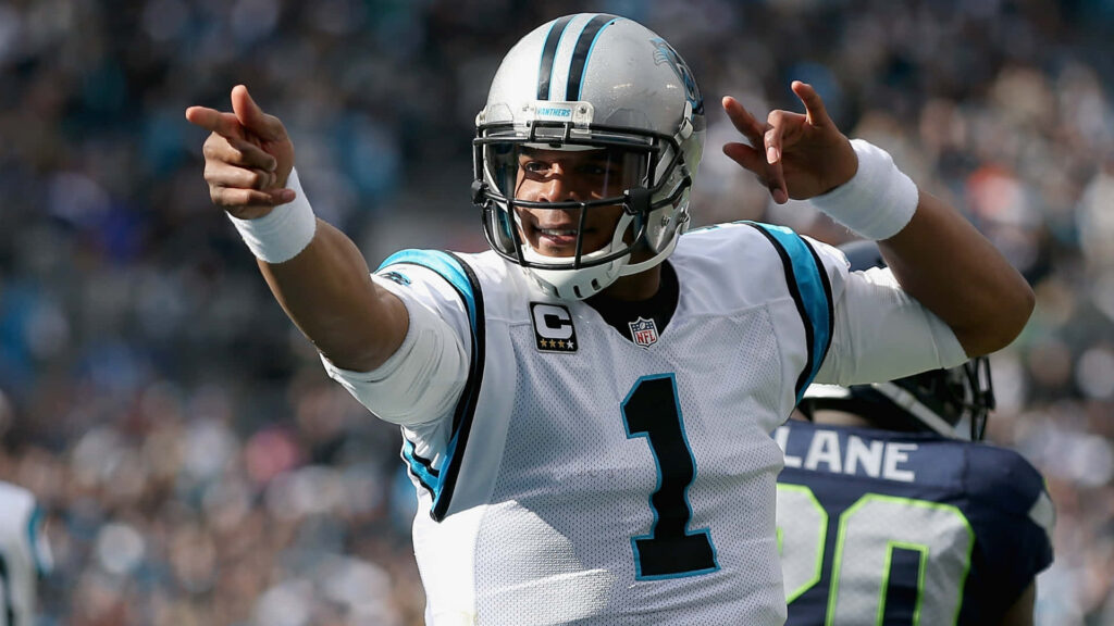 Cam Newton in Carolina Panthers jersey confident NFL leader dynamic football wallpaper background