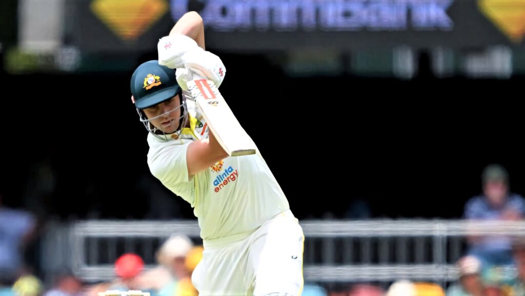 Cameron Green batting in Australian Test cricket uniform mid-action in high-resolution stadium background Wallpaper