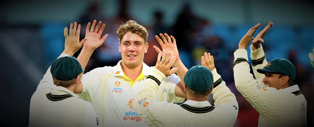 Cameron Green celebrating cricket victory with teammates in white uniforms vibrant stadium background Wallpaper