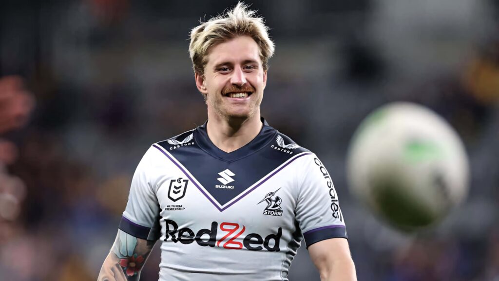 Cameron Munster Melbourne Storm jersey smiling rugby league player vibrant high-definition wallpaper