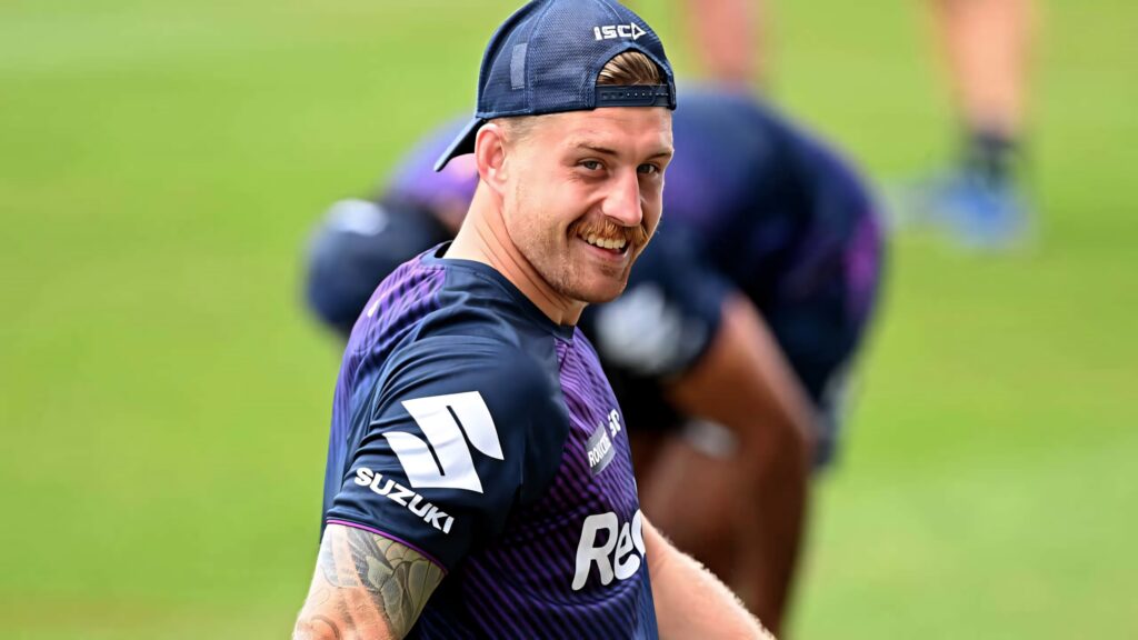Cameron Munster in navy purple kit training outdoors showing rugby determination and energy Wallpaper