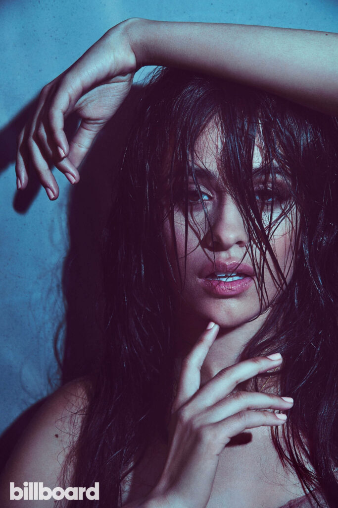 Camila Cabello Billboard Wallpaper: Intense Gaze & Moody Background