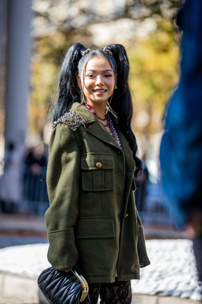 Stylish Bella Poarch Candid Photo Wallpaper: Chic Green Jacket & Accessories