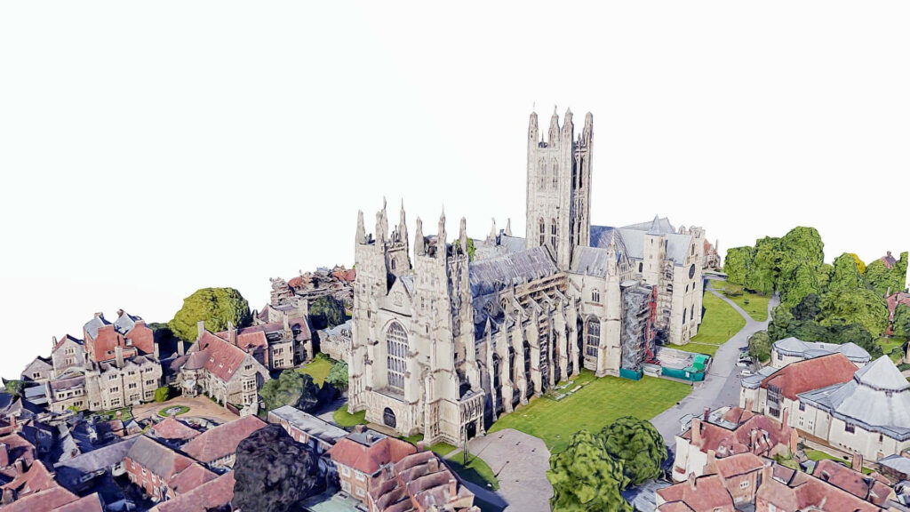 3D model of Canterbury Cathedral north view with Gothic spires intricate stonework and greenery Wallpaper
