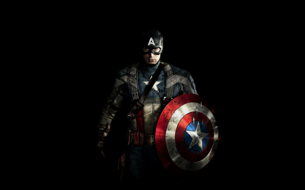 Captain America heroically poses with shining shield dark background detailed uniform cinematic wallpaper