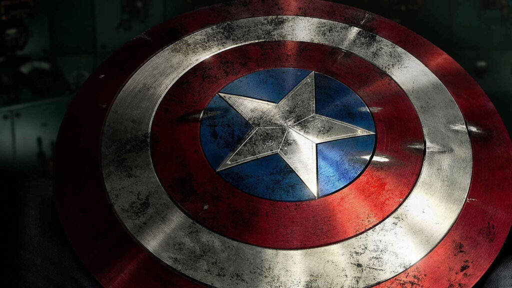 Captain America shield wallpaper with weathered metal star emblem bold red white blue colors
