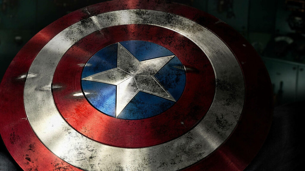 Defender of Justice: Captain America Stands Strong, Shield at the Ready Wallpaper