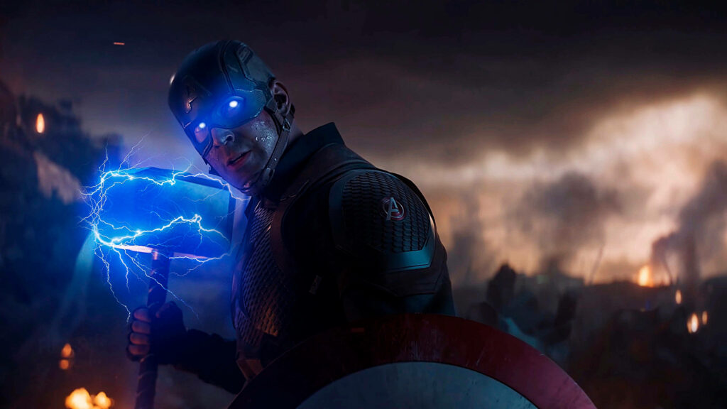 Captain America wielding Mjolnir with blue lightning and shield on stormy battlefield background Wallpaper