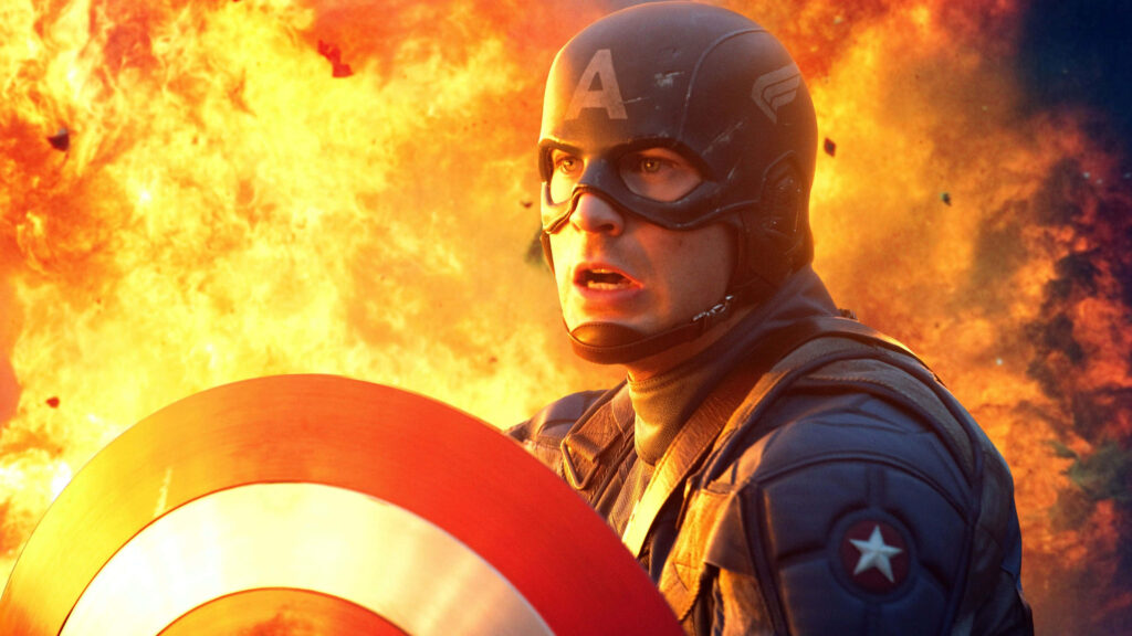 Captain America's Startling Encounter Amidst Fiery Chaos Wallpaper