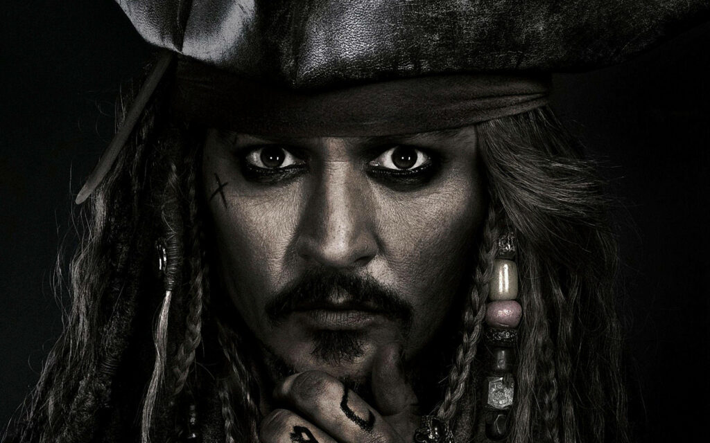 Johnny Depp as Captain Jack Sparrow intense HD portrait dark tones detailed pirate accessories Wallpaper