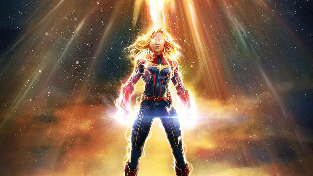 Captain Marvel: Balancing Superhero Duties and Digital Realm Wallpaper