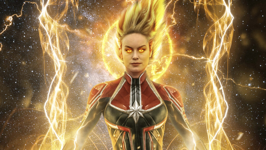 Captain Marvel Brie Larson cosmic portrait glowing golden eyes vibrant galactic background wallpaper