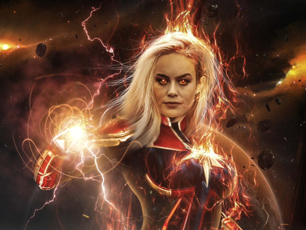 Captain Marvel Brie Larson fierce pose white suit glowing eyes fiery effects dynamic background wallpaper