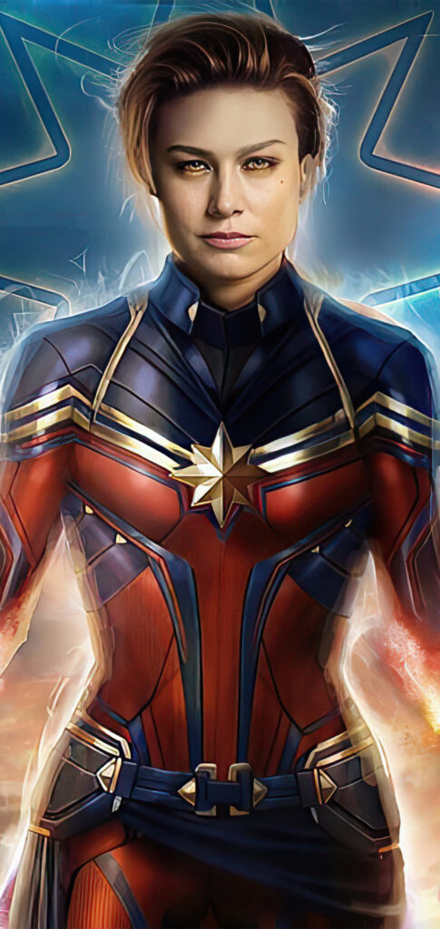 Brie Larson as Captain Marvel in vibrant red blue gold suit with dramatic lighting wallpaper